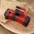 Classic tortoise shell hair claw clip in red and black resin with high shine finish - 8.5cm Amber Red
