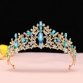 Macro detail of golden bridal crown featuring blue rhinestones and clear crystals - KC Gold Lake Blue Crystal Crown