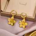 Macro detail of gold flower earrings with polished 18K finish on a silk background - 1301-Gold Textured Flower