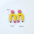 Creative yellow pencil earrings 48mm tall 5g weight on minimalist grey background - Rainbow Pencil