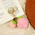 Handmade crochet pink peach keychain with green leaves and gold metal ring for bags - Peach