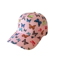 Detail of pink kid's baseball cap with colorful butterfly print and twill fabric texture - Colorful Butterfly