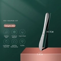 Polished stainless steel dinner knife on minimal peach block with green background - Small Dinner Knife