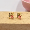 Detailed close-up of golden beetle earrings with pink gemstones on a wooden base - Pink Insect Style (ZYN-DME243G-D) / Gold/Pink