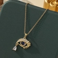Collier Mauvais Œil doré avec pierre bleue et zircons sur boîte verte - A20 - Or