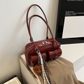 Dark red patent leather underarm bag with front pockets and a brown plush bear charm - With Charm / Burgundy
