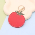 Cute tomato-shaped red PU leather keychain with green leaf and golden metal ring - Keychain style / Tomato