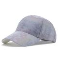 Detail of breathable mesh camouflage baseball cap with light gray pattern and curved brim - Purple