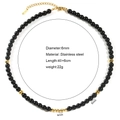 Collana in pietra naturale nera e perle con perline in acciaio inossidabile dorato - Nero