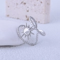 Minimalist stainless steel sun ring with beaded texture on a white textured stone surface - US 7 / Silver