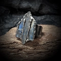 Macro shot of an antique silver ring with blue labradorite stone and rustic metal texture - Kyanite Raw Stone (Adjustable)