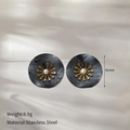 Detail view of 42mm floral earrings showing stainless steel material and 8.9g weight - Black