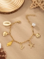 Golden ocean theme bracelet featuring starfish, seashell, pearl, and V-letter charms - Letter V(V)