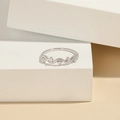 Minimalist S925 sterling silver wavy ring with five sparkling cubic zirconia stones - US 5 / White Gold