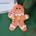 Gingerbread man ornament with red bow and candy cane on green festive background - White Scarf Cane (Height 13cm)
