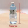 Detailed macro view of a 30mm miniature sparkling water bottle for dollhouse decor - Mineral Water 1