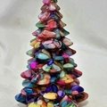 Mini resin Christmas tree ornament made of colorful gemstone chips on white background - Colorful Shell