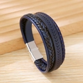 Dettaglio di treccia in pelle multistrato blu scuro e nera con chiusura magnetica argento - Blu Scuro