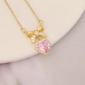 Pink heart pendant necklace with butterfly bow detail on a white ceramic plate - Simple Bow Pink Heart (3#)