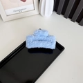 Plush blue rectangular hair claw clip for women, shown on a black display tray - Medium Blue (approx. 10cm)