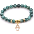 Green dot stone beaded bracelet with golden Hamsa hand charm and rhinestone accents - Green Spotted Stone (Hamsa Hand)