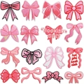 Set of 16 embroidered bow patches in pink and red tones for clothing DIY projects - Set of 16
