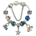 Blue ocean-themed charm bracelet featuring sea star and shell charms on leather cord - A13 / 17cm