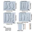 DIY resin mold set with sizes for 4 dagger silicone molds, measuring cup, and wood sticks - Defensive Knife Silicone Mold Set (Set 38)