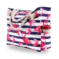 Close-up of large canvas tote with pink flamingo print and functional side pocket - Flamingo Print