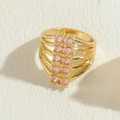 Vergoldeter mehrlagiger Ring mit zwölf funkelnden rosa Zirkonia-Steinen besetzt - Rosa Zirkon
