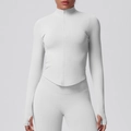Close-up of seamless ribbed grey sports jacket featuring stand collar and thumbhole cuffs - Feather Beige