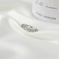 Silver hollow heart ring with zircon stones on white silk satin background - Silver - Heart Hollow Ring Clasp