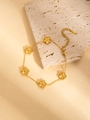Macro detail of 18K gold-plated stainless steel flower bracelet with textured petals - Five-petal Flower Style