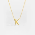 Detail of S925 sterling silver K letter pendant with small round zircon stone inlay - Letter K