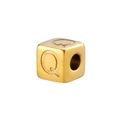 Macro view of a 14K gold-plated stainless steel cube bead featuring an engraved letter Q - Letter Q / Gold