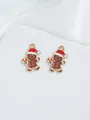 Detailed view of gingerbread man charms with red hats for DIY Christmas jewelry making - Gingerbread with Candy Cane (Style 14)