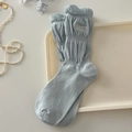 Hellblaue Strick-Stulpen mit Bebe Bonjour Stickerei und gerüschten Schleifenbündchen - Einheitsgröße / Hellblau