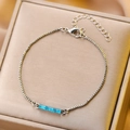 Silver bracelet with four rectangular sea blue crystals on a refined box chain - White Gold Sky Blue Rectangle Crystal Bracelet (3295)