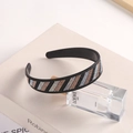 Elegant black wide headband with striped rhinestones in white and gold tones - Striped Black Champagne AB