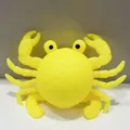 Détail du jouet crabe en silicone jaune vif avec trous de pulvérisation d'eau - Crabe Jaune