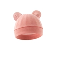 Detail view of pink knitted baby hat featuring cute bear ears and soft cotton texture - One Size / Shrimp Pink