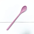 Single pink melamine long-handle spoon for desserts and shakes on white background - Pink