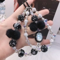 Handcrafted Nepal style beaded phone chain with rhinestones and plush charms - Black and White Rhinestone