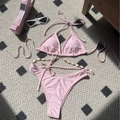 Pink triangle bikini set with high-cut bottoms and decorative white seashell waist chain - S / Pink