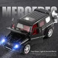 Modellino Mercedes-Benz Classe G nero con porte apribili e fari blu luminosi a LED integrati - 739 Nero-4 Porte Apribili SUV