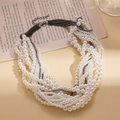 Elegant multi-layer baroque faux pearl necklace with rhinestone-encrusted metal chains - White