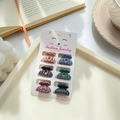 Set of 6 mini matte Morandi hair claws for women on a cat-themed display card - Pumpkin Claw A 2.5cm