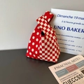 Knitted tote bag with red checkerboard and polka dot pattern in a casual bucket style - Xmas Red Patchwork Polka Dot