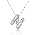 Macro shot of silver letter N pendant with micro-paved zircons and reflective detail - Letter N