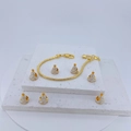 Detail of gold snake chain bracelet with white enamel triangle beads on stone bases - White/Gold
